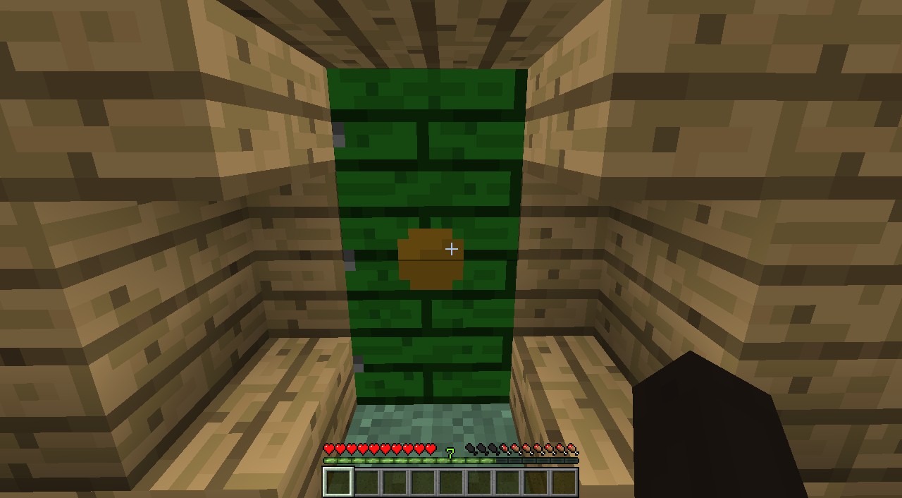 A Hobbit Hole door surrounded by stairs