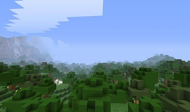 A forest biome with mountains in the background