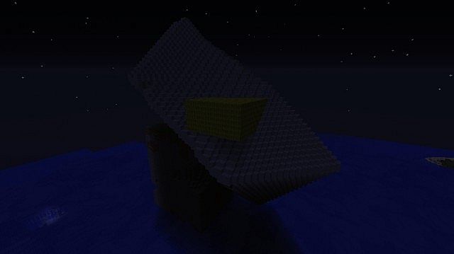 Just a big rock with a large melon on it.