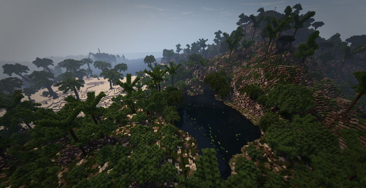 A small lake behind the beach surrounded by willows