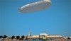 The Dustworks Zeppelin flying over the Sail Port district. Rendering courtesy of Miner332.