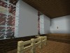 The backroom, can be used for storage or offices. Includes stairwell to the basement